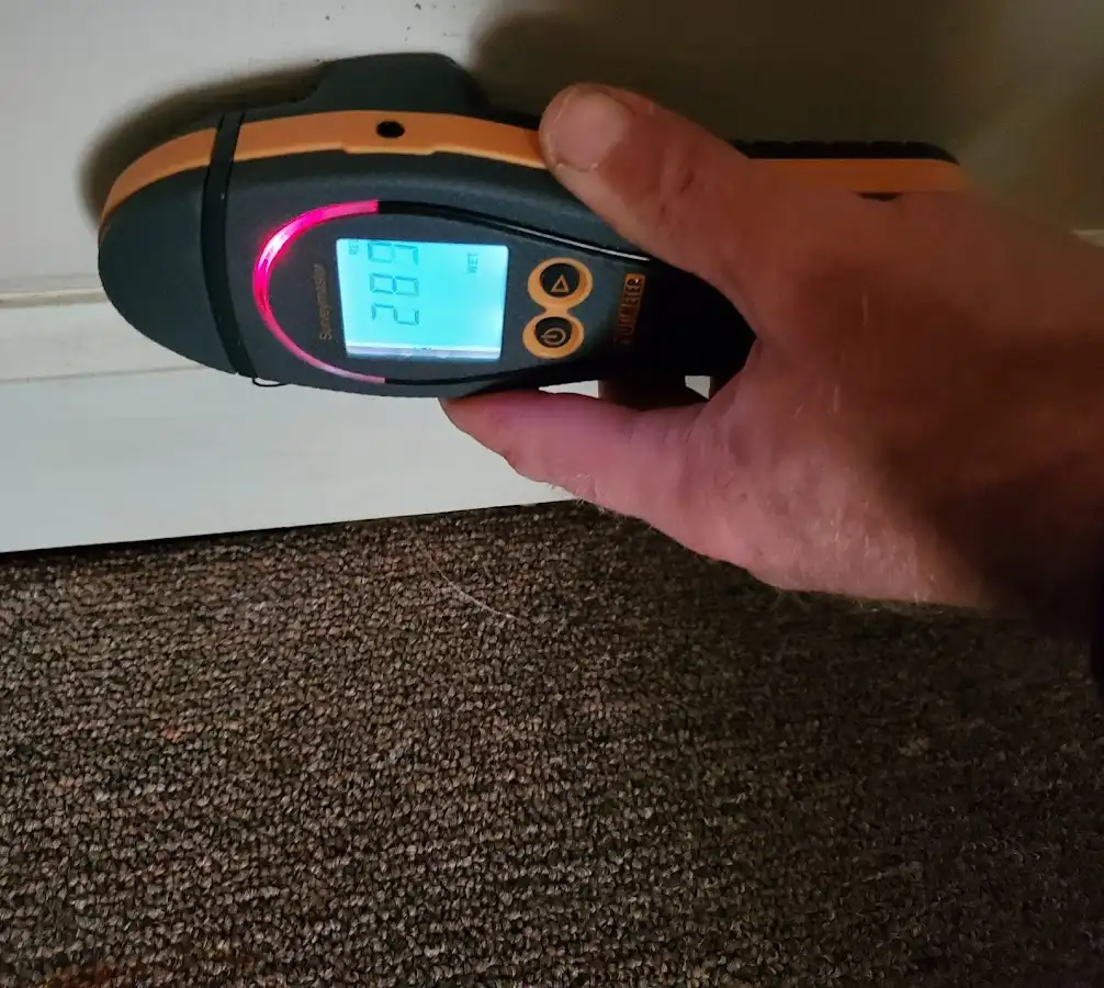 Moisture detection at baseboard during Burst Pipe Cleanup in Altoona